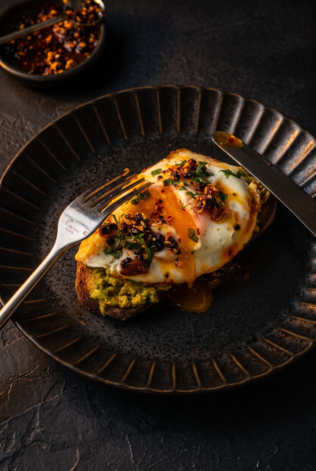 Fried egg on sourdough topped with chilli crisp